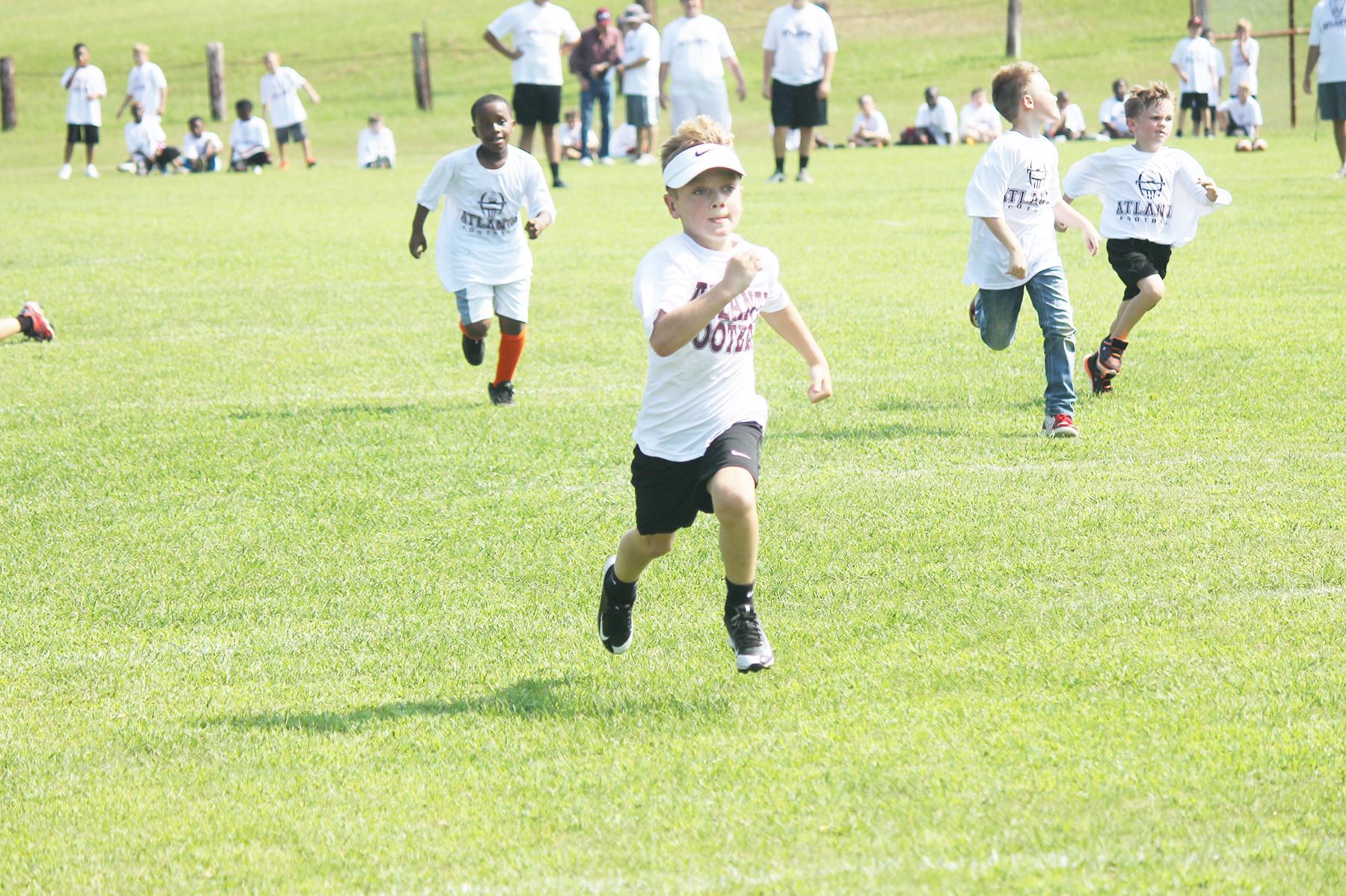 Photos from Atlanta’s summer youth football camp Cass County Citizens